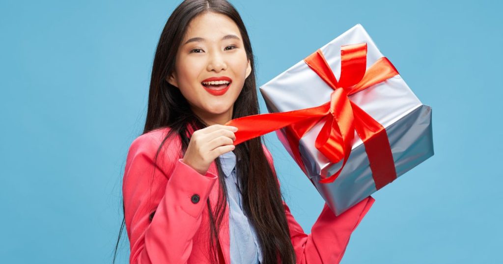 woman opening Best Gifts For Cricut Lovers